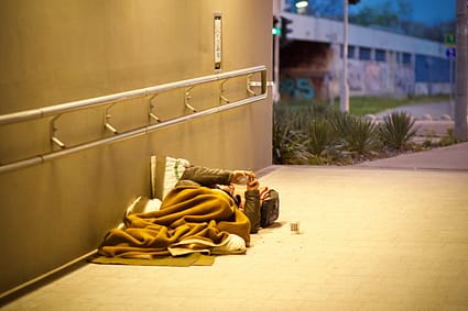 the housing crisis & homelessness - textile under the wall mounted hooks