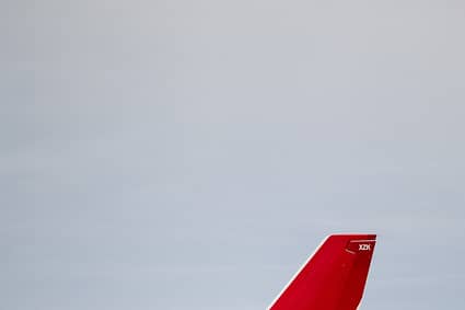 a plane on the runway Qantas upgrade palm greasing of politicians